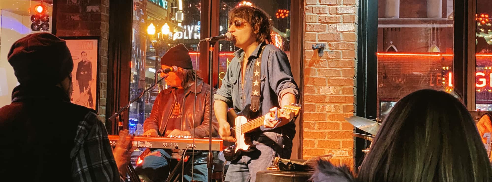 bar singer on guitar in Buffalo